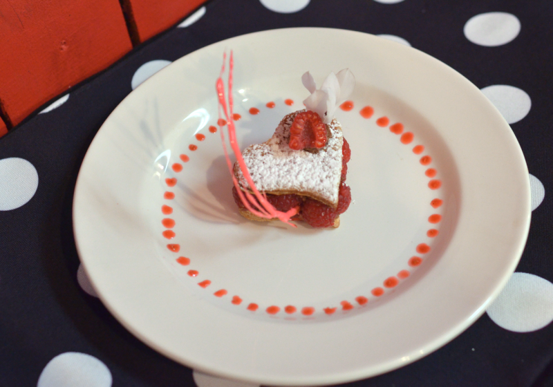 Chocolate Mousse with fresh raspberries between a light & crispy pastry