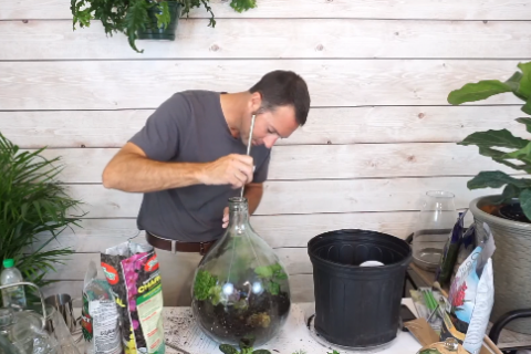 Mike making a terrarium